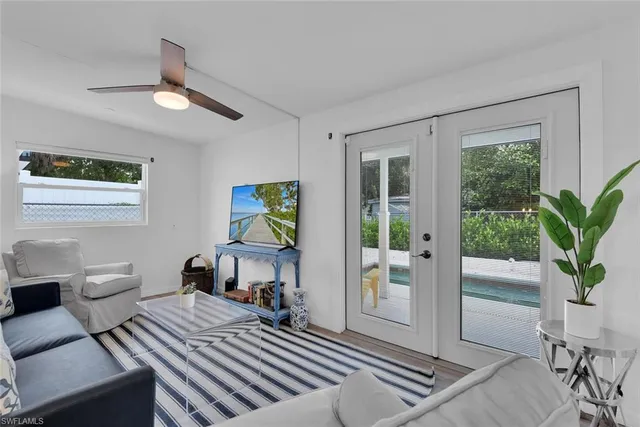 a bedroom with furniture and a window