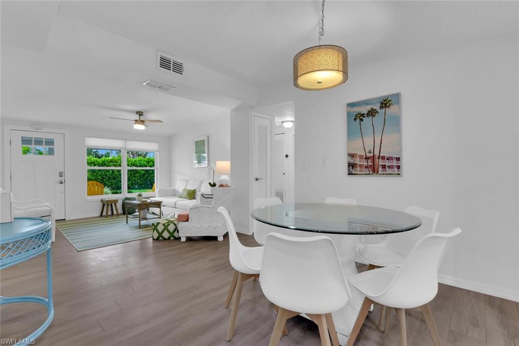 2048 Holiday Lane Naples, FL 34104 - Photo 6 of 28 a living room with furniture and a window