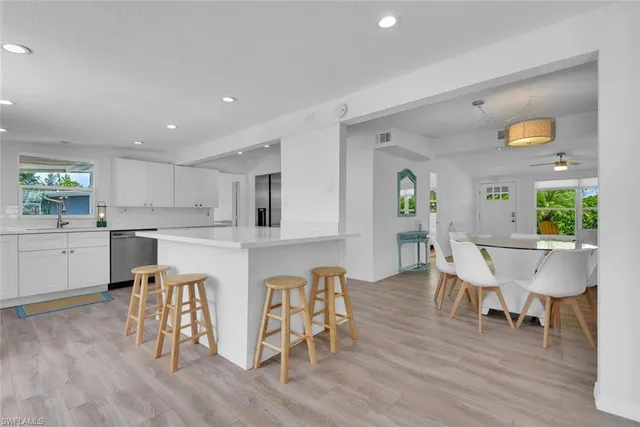 a view of kitchen with breakfast area