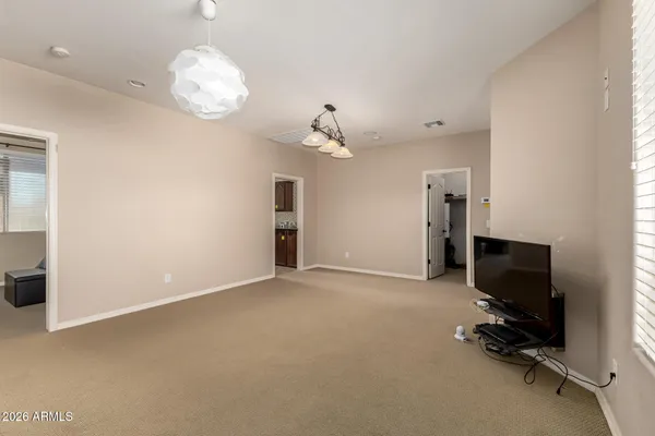 a view of a livingroom with a flat screen tv