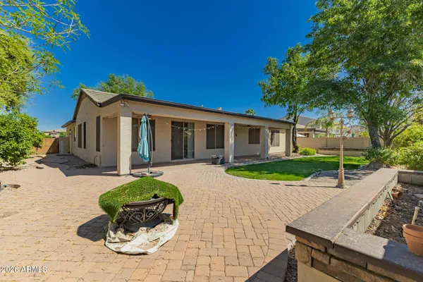 a front view of a house with a yard outdoor seating and yard