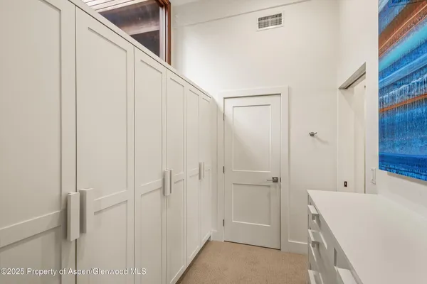 a bathroom with a bathtub and shower