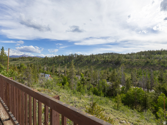 4770 Pine Crest Road Evanston, UT 82930 - Photo 6 of 24 Expansive deck featuring a wood-finish railing