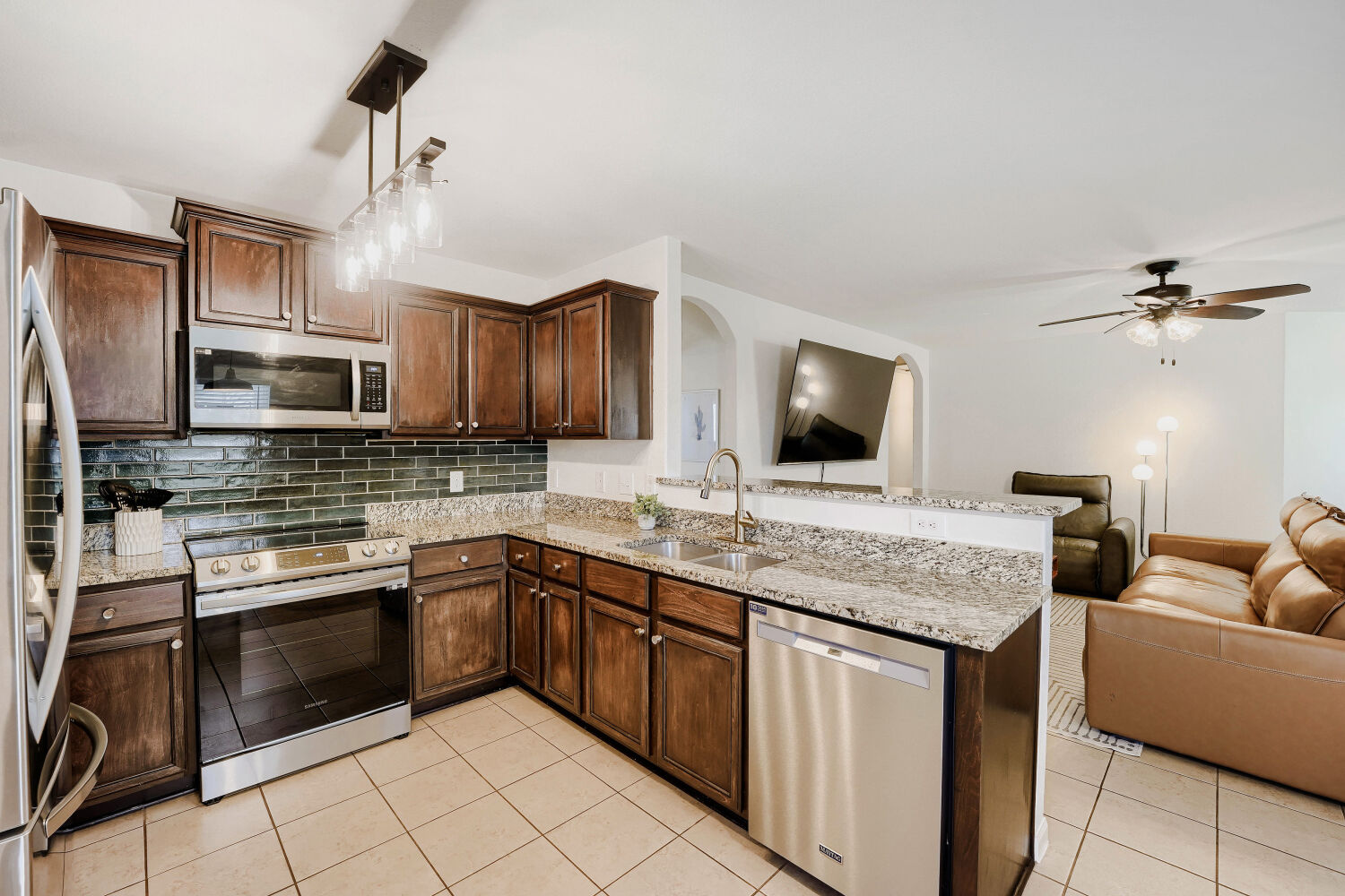 116 Millers Loop Jarrell, TX 76537 - Photo 10 of 23 An updated kitchen backsplash adds character and contemporary style, reflecting the thoughtful improvements made by the sellers.