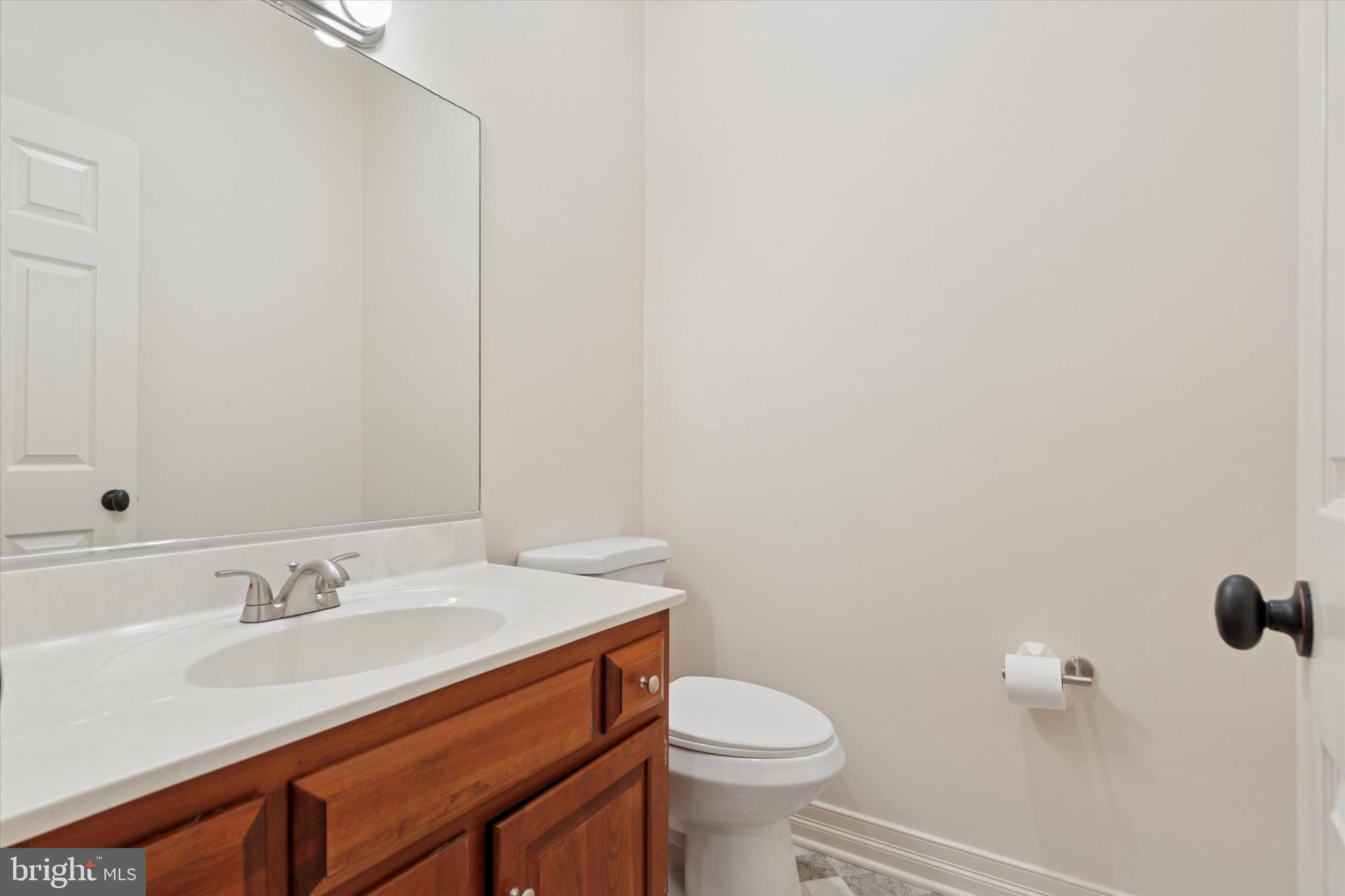 2824 Hill Road Green Lane, PA 18054 - Photo 14 of 40 a bathroom with a sink and a toilet