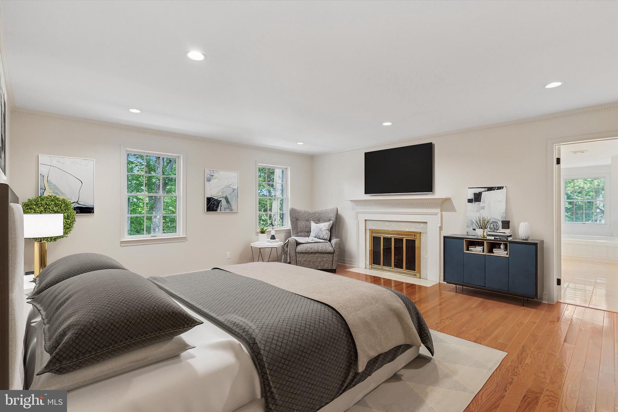 2824 Hill Road Green Lane, PA 18054 - Photo 16 of 40 a bedroom with a bed and a flat screen tv