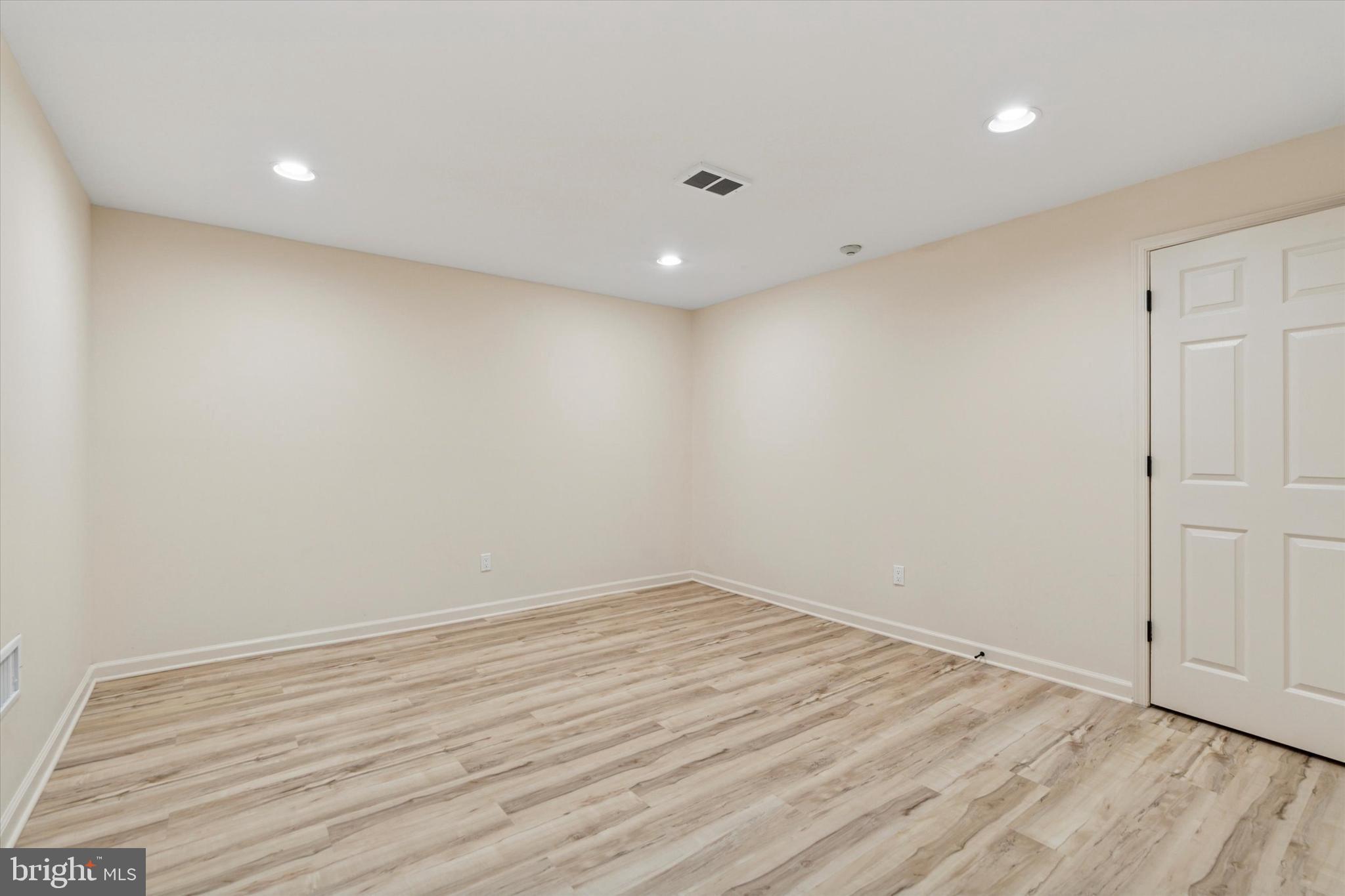 2824 Hill Road Green Lane, PA 18054 - Photo 25 of 40 a view of room with wooden floor and fan