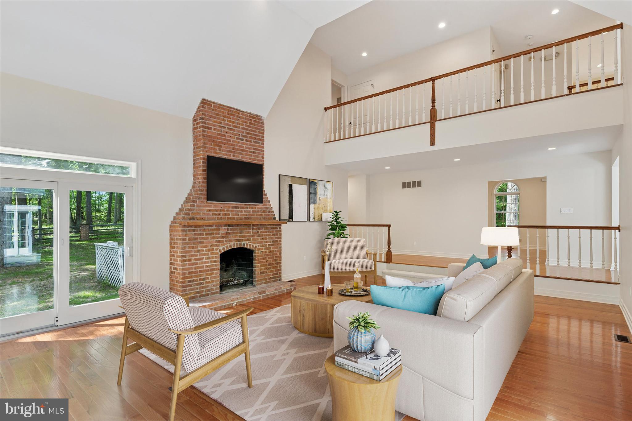 2824 Hill Road Green Lane, PA 18054 - Photo 4 of 40 a living room with furniture and a fireplace