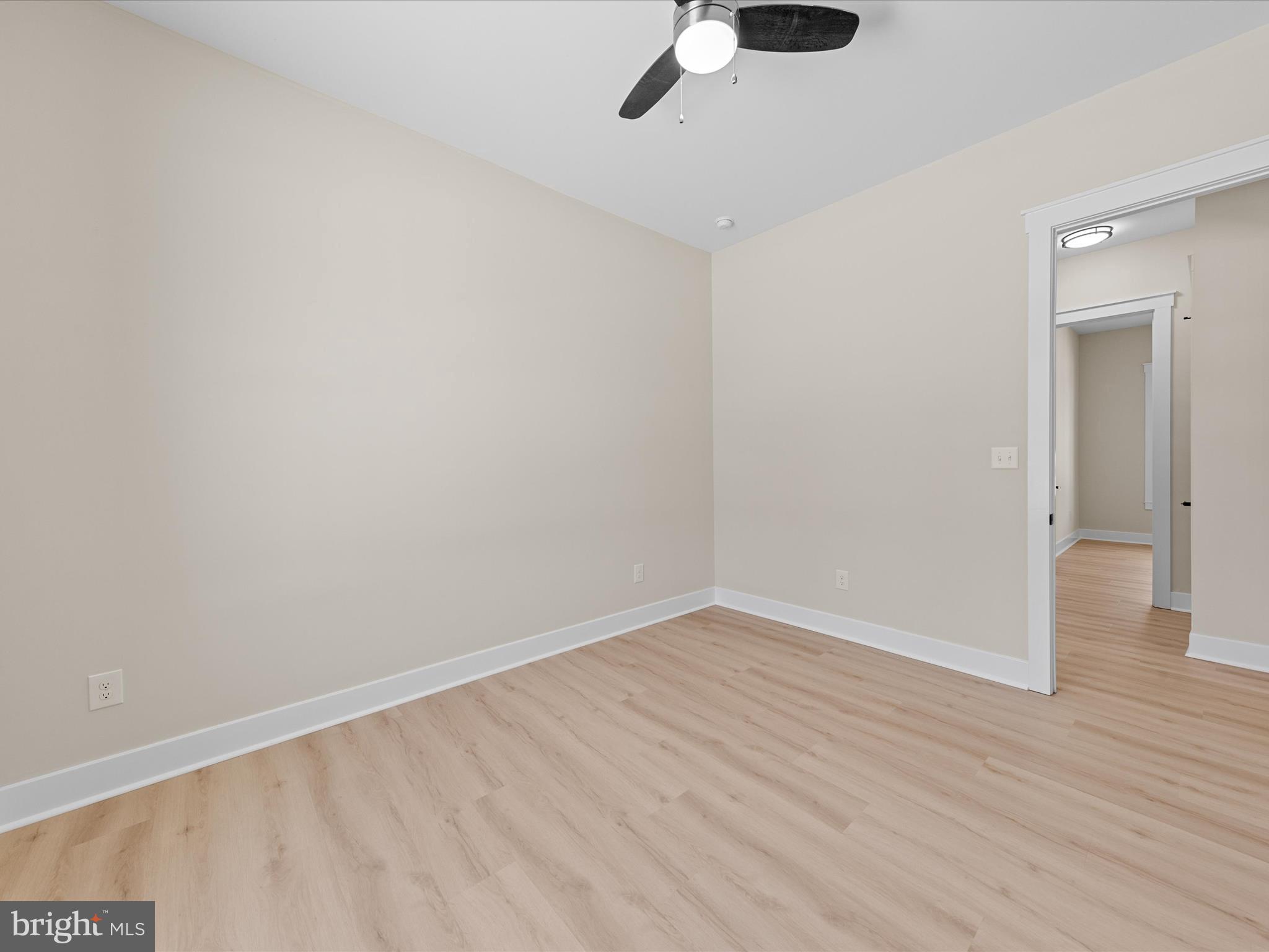 37000 Brittingham Road Delmar, DE 19940 - Photo 41 of 74 a view of an empty room with wooden floor