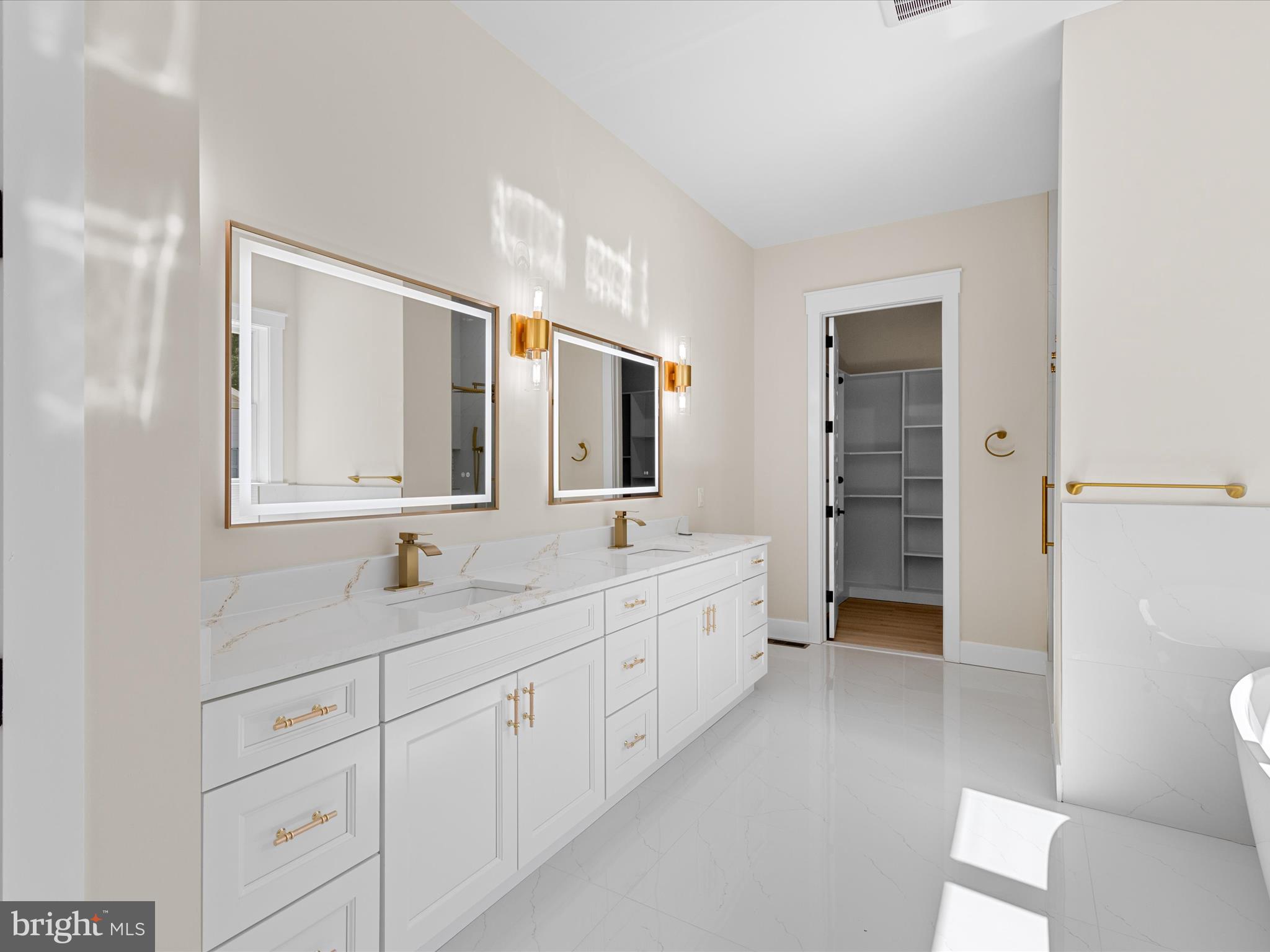 37000 Brittingham Road Delmar, DE 19940 - Photo 46 of 74 a bathroom with a double vanity sink mirror and toilet