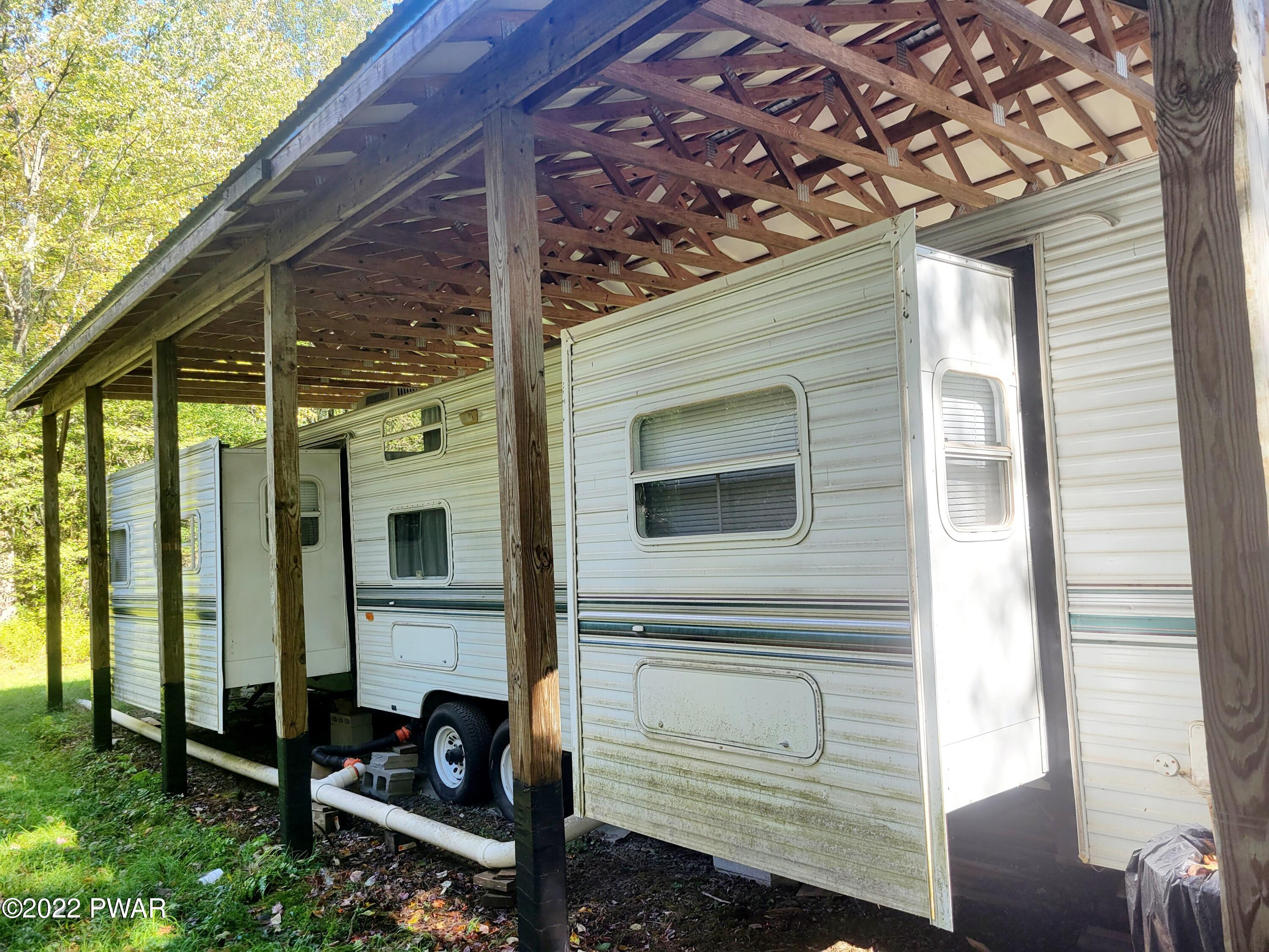Welk Road Equinunk, PA 18417 - Photo 3 of 16 Side of Camper