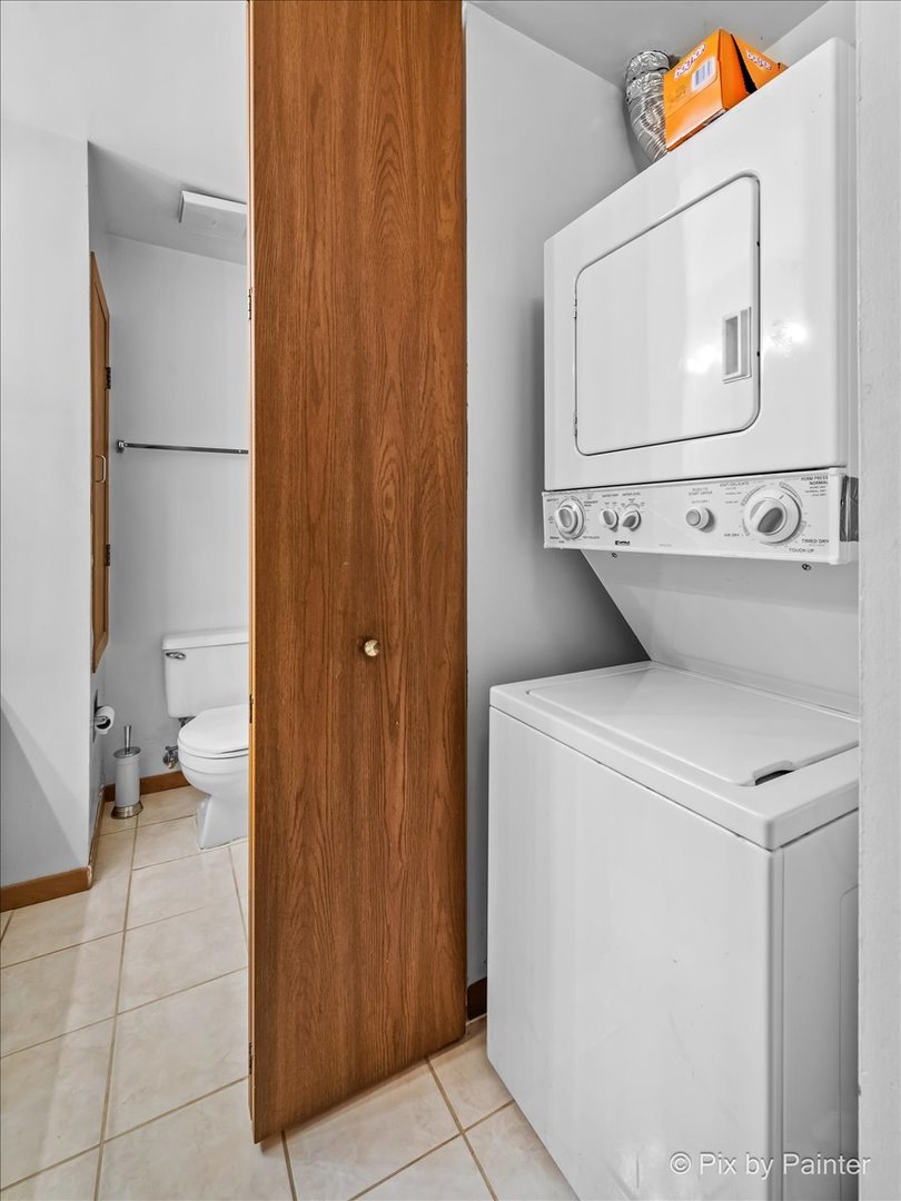 47 Orchard Terrace, Unit 8 Lombard, IL 60148 - Photo 13 of 16 a utility room with dryer and washer