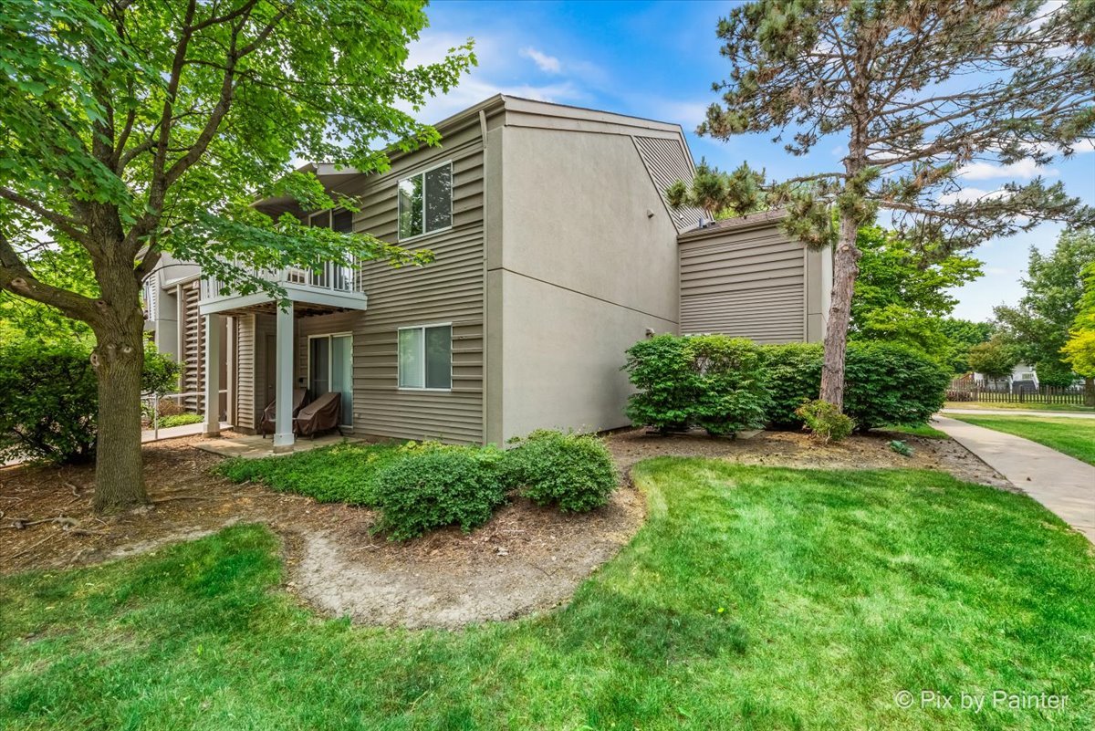 47 Orchard Terrace, Unit 8 Lombard, IL 60148 - Photo 16 of 16 a view of a house with a yard