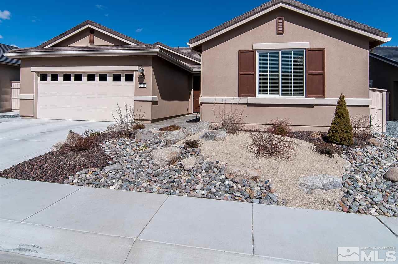 2145 Blue Oaks Drive Reno, NV 89521 - Photo 1 of 1 a front view of a house with a yard