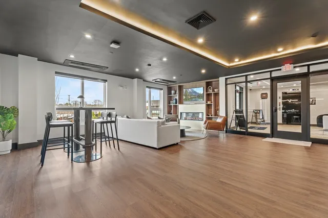 a living room with furniture and a table