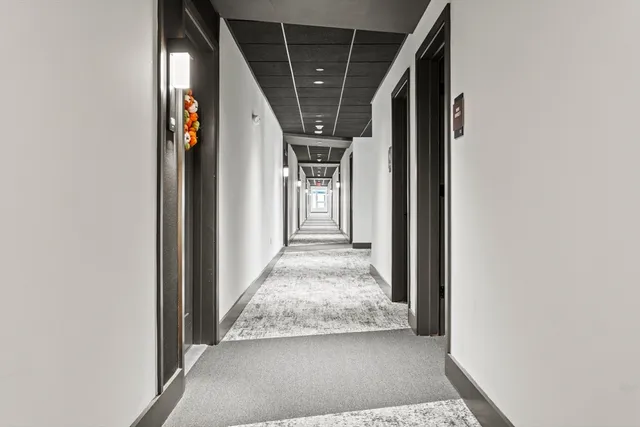 a view of a workspace with furniture