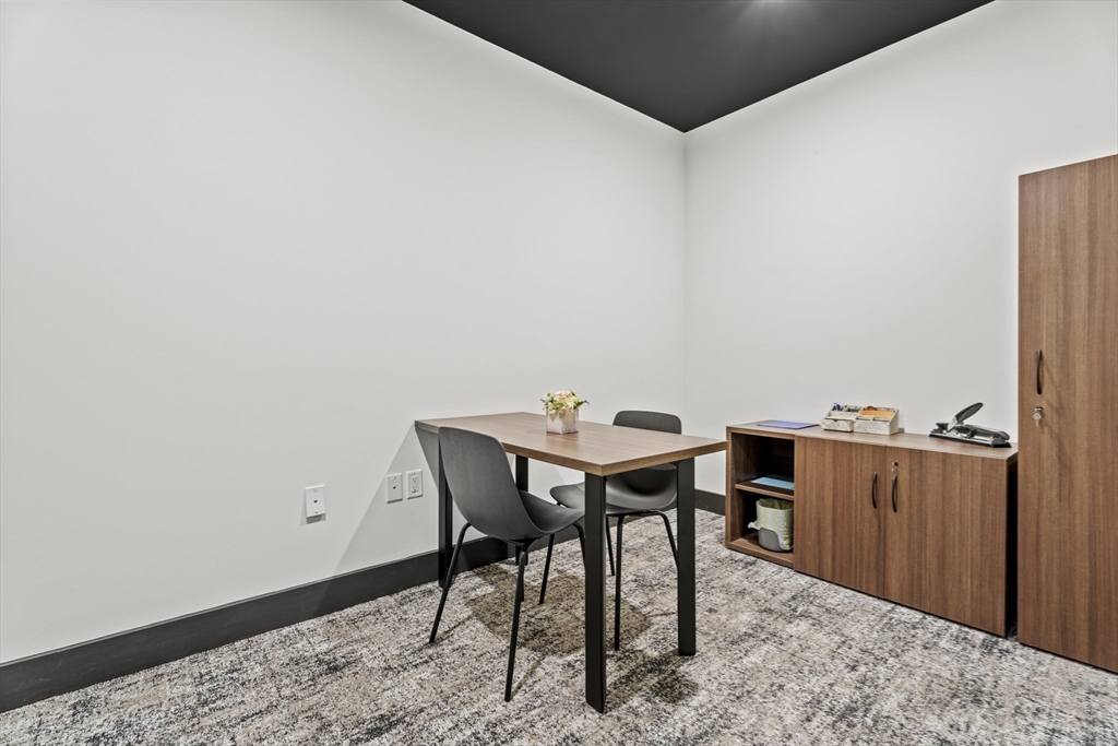 203 Lowell Street, Unit 103 Wilmington, MA 01887 - Photo 28 of 39 a view of a workspace with furniture