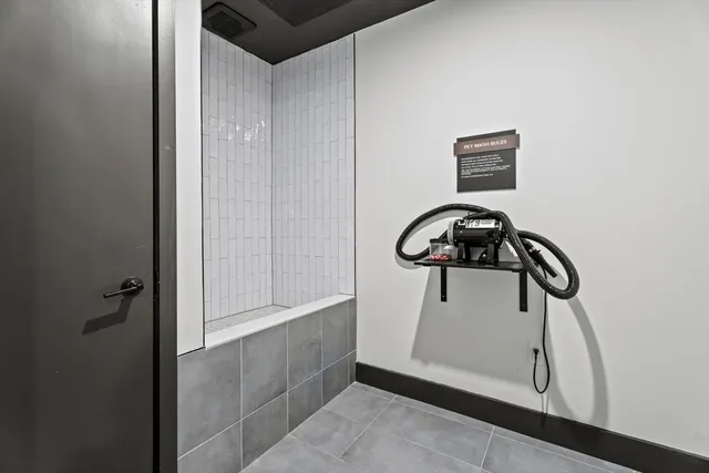 a view of parking garage with cars and other equipment