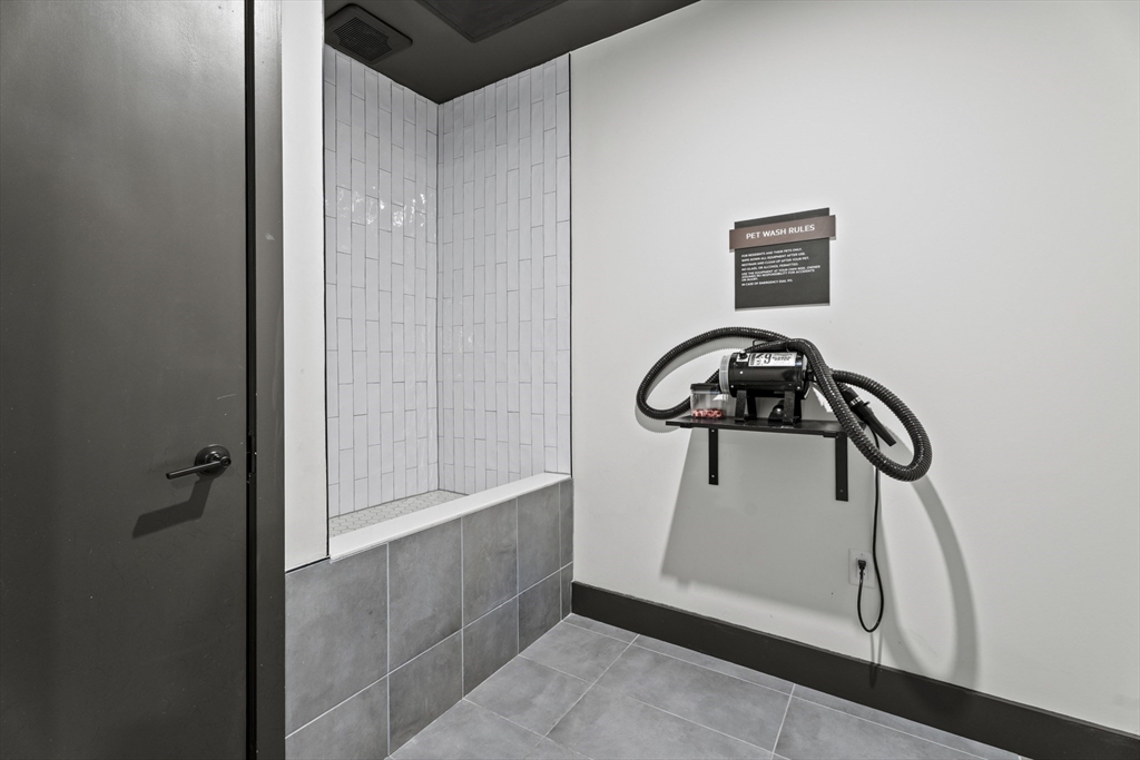 203 Lowell Street, Unit 103 Wilmington, MA 01887 - Photo 30 of 39 a view of a closet area