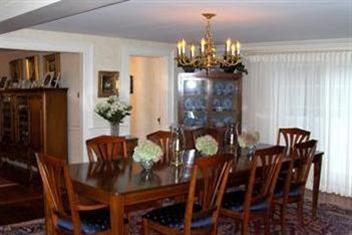 36 Rendezvous Lane Barnstable, MA 02630 - Photo 13 of 23 a view of a dining room with furniture and chandelier