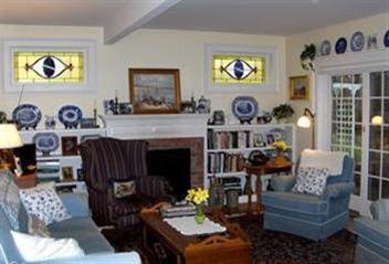 36 Rendezvous Lane Barnstable, MA 02630 - Photo 14 of 23 a living room with furniture and a fireplace