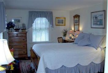 36 Rendezvous Lane Barnstable, MA 02630 - Photo 15 of 23 a bed room with a bed and a window