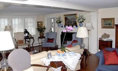 36 Rendezvous Lane Barnstable, MA 02630 - Photo 17 of 23 a living room with furniture and a lamp