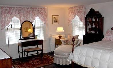 36 Rendezvous Lane Barnstable, MA 02630 - Photo 19 of 23 a living room with furniture a window and a potted plant