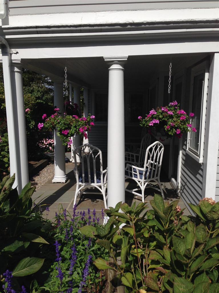 36 Rendezvous Lane Barnstable, MA 02630 - Photo 23 of 23 a view of front door of house with potted plant