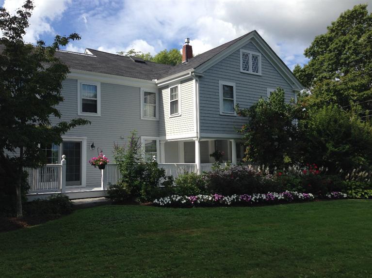 36 Rendezvous Lane Barnstable, MA 02630 - Photo 6 of 23 a front view of house with yard and green space
