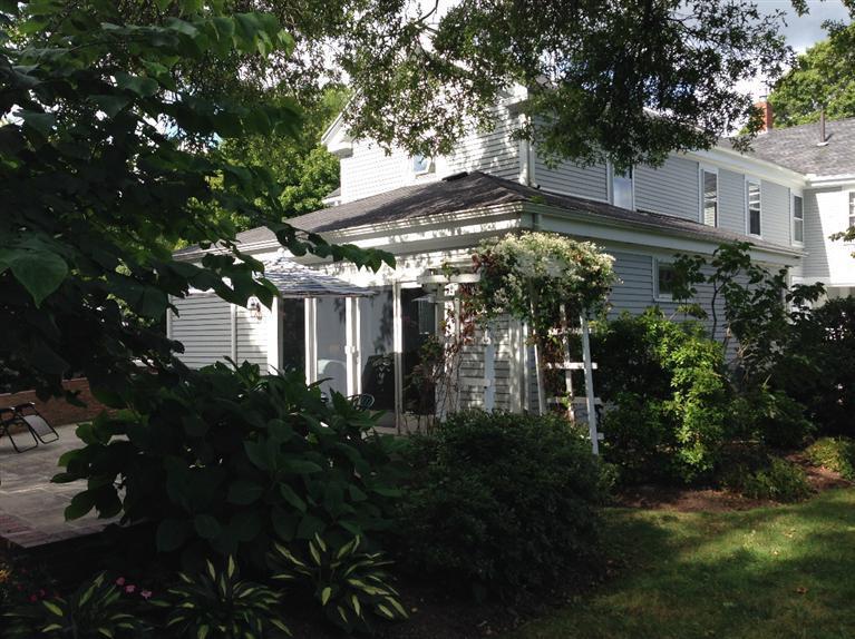 36 Rendezvous Lane Barnstable, MA 02630 - Photo 8 of 23 a view of a backyard with plants