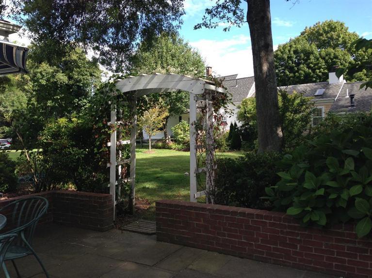 36 Rendezvous Lane Barnstable, MA 02630 - Photo 10 of 23 a backyard of a house with lots of green space