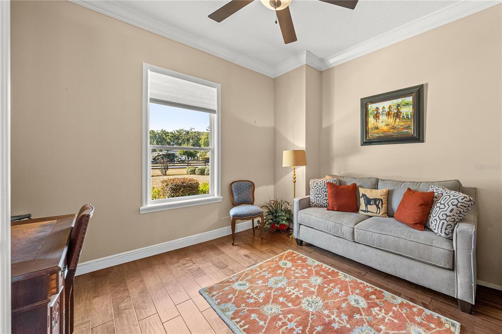 4681 Northwest 101st St Road Ocala, FL 34482 - Photo 12 of 33 a living room with furniture and a window