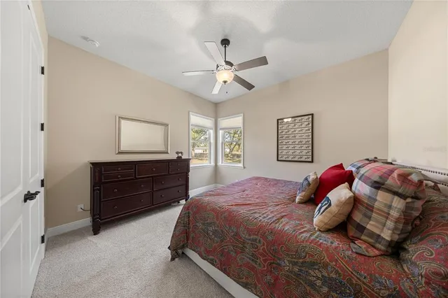 a view of a house with a yard porch and sitting area