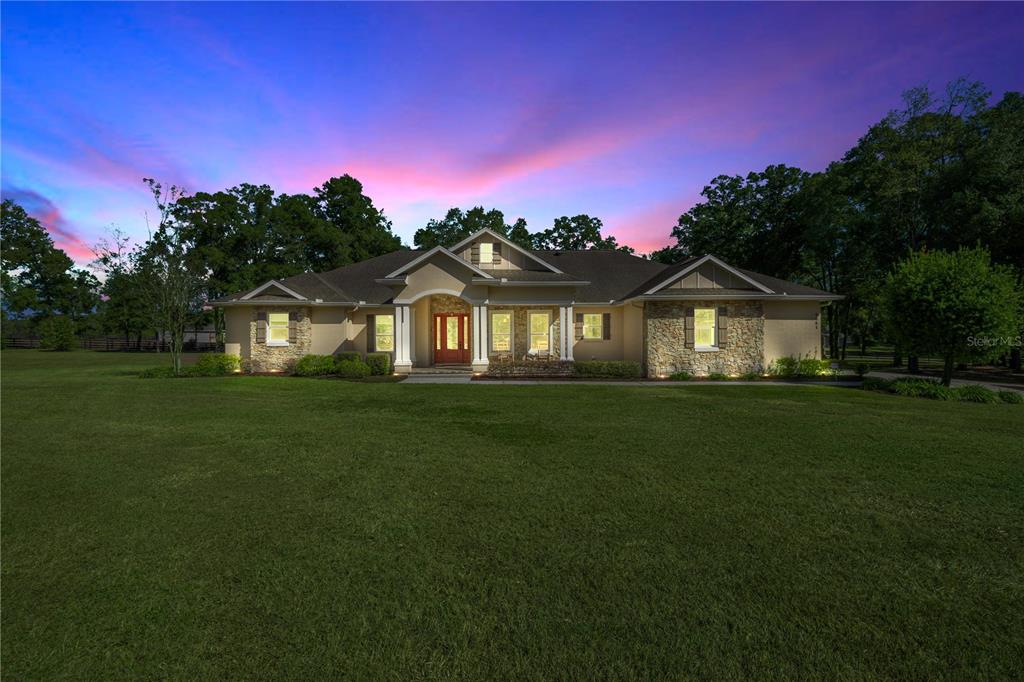 4681 Northwest 101st St Road Ocala, FL 34482 - Photo 33 of 33 a front view of a house with a yard