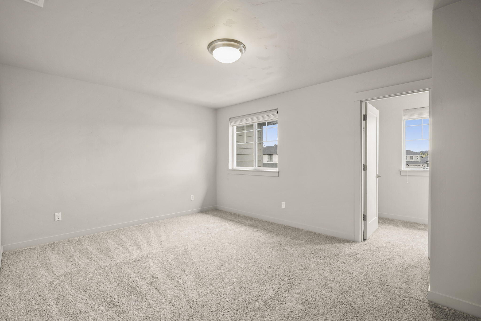 2366 Northeast Victor Place Bend, OR 97701 - Photo 15 of 31 a view of an empty room with a window