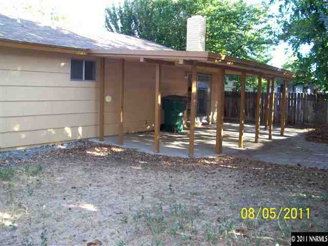 2827 Jake Street Reno, NV 89502 - Photo 3 of 13 a backyard of a house with barbeque oven