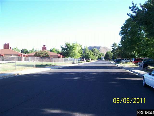 2827 Jake Street Reno, NV 89502 - Photo 4 of 13 a view of swimming pool with outdoor seating and yard