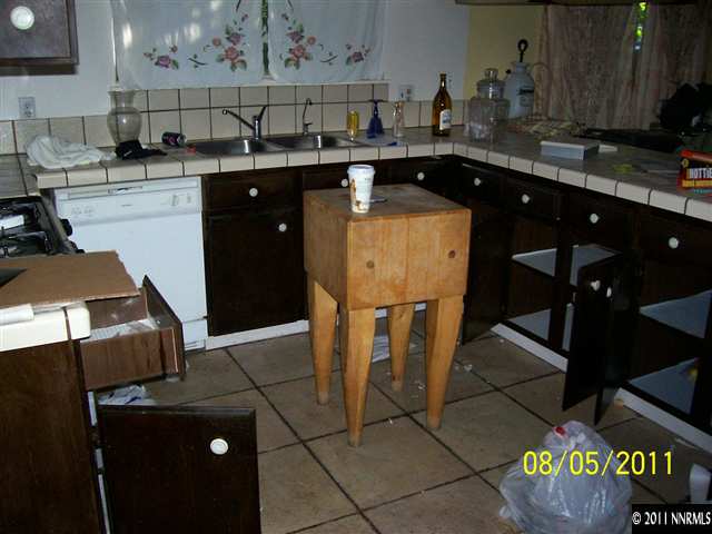 2827 Jake Street Reno, NV 89502 - Photo 8 of 13 a kitchen with a sink and cabinets