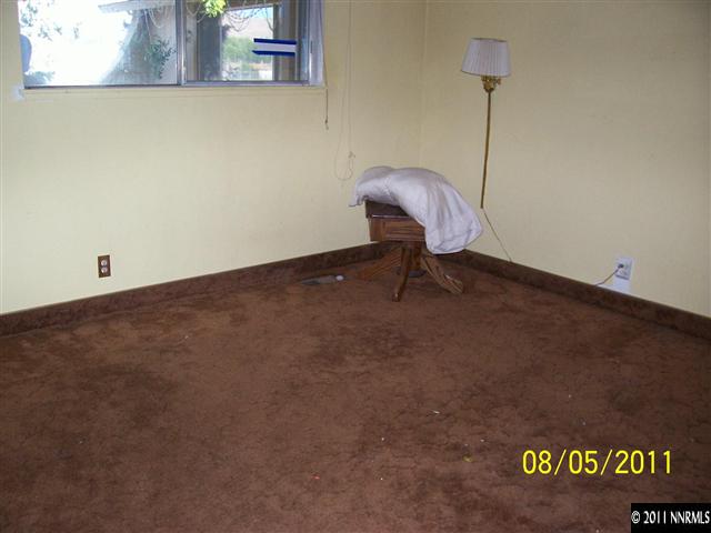 2827 Jake Street Reno, NV 89502 - Photo 10 of 13 a room with a table and a chandelier