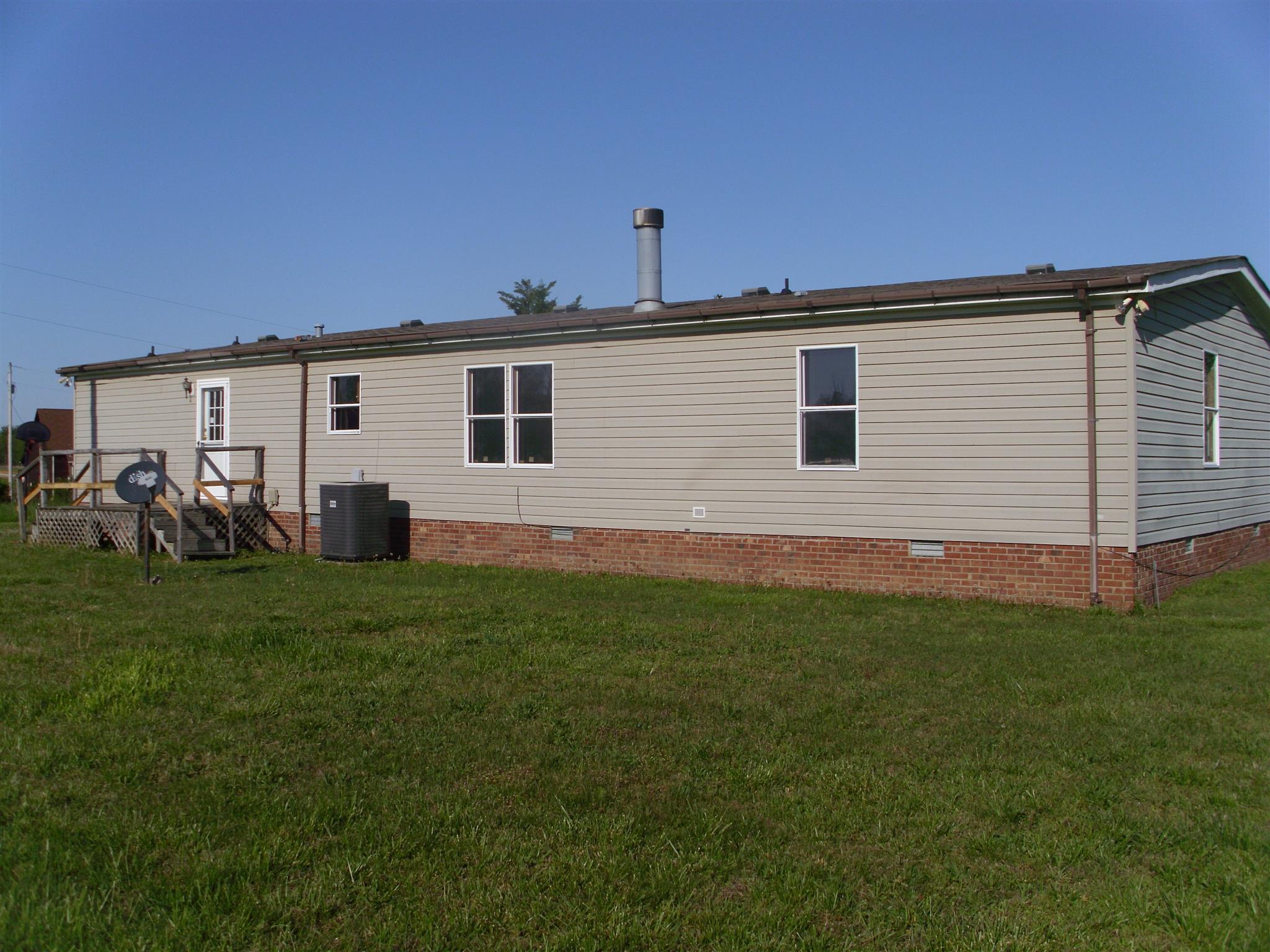 3763 Hoods Branch Road Springfield, TN 37172 - Photo 2 of 15 a view of a backyard with plants and a backyard