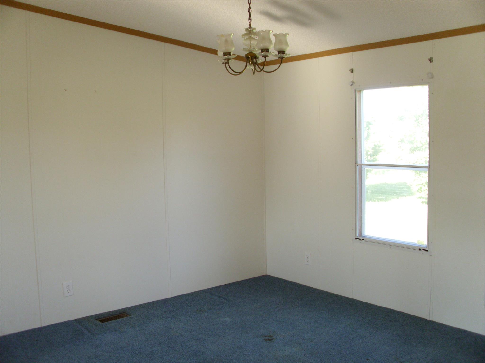 3763 Hoods Branch Road Springfield, TN 37172 - Photo 5 of 15 a view of a small space with a window and a fan