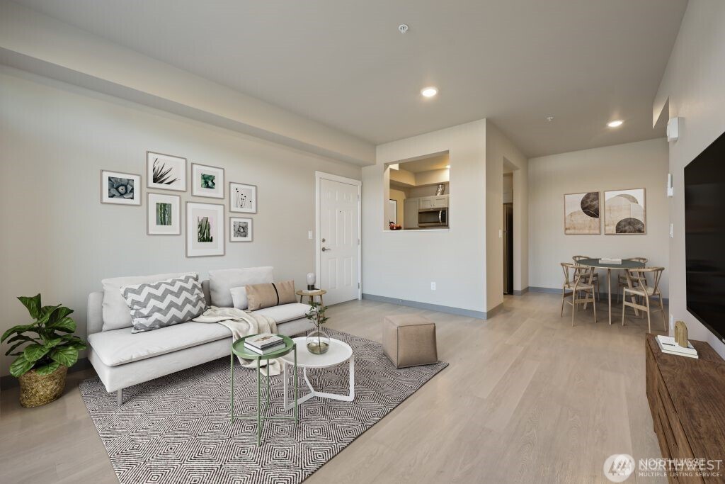 1202 East 72nd Street Tacoma, WA 98404 - Photo 14 of 25 a living room with furniture and a table