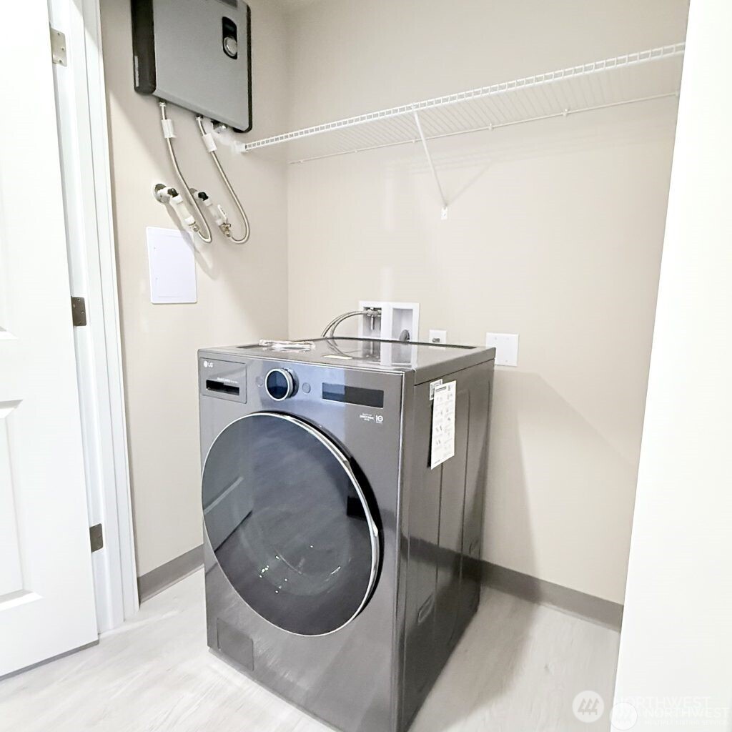 1202 East 72nd Street Tacoma, WA 98404 - Photo 18 of 25 a utility room with dryer and washer