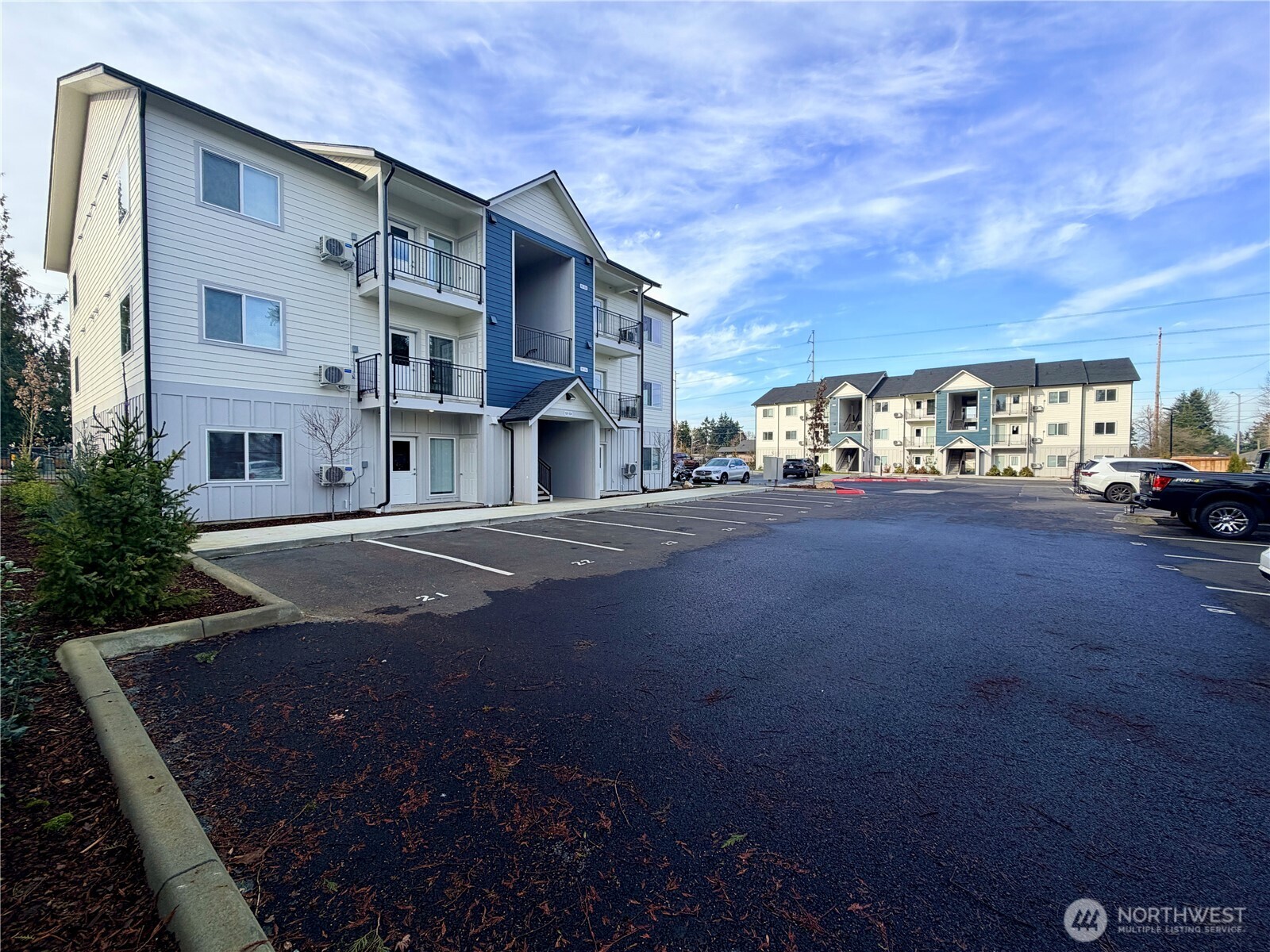 1202 East 72nd Street Tacoma, WA 98404 - Photo 2 of 25 a view of street with parked cars