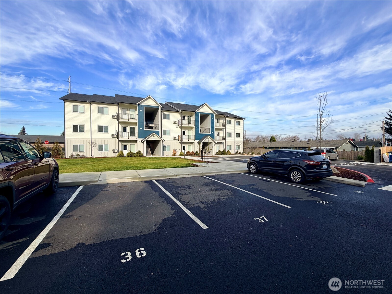 1202 East 72nd Street Tacoma, WA 98404 - Photo 4 of 25 a view of street with parked cars