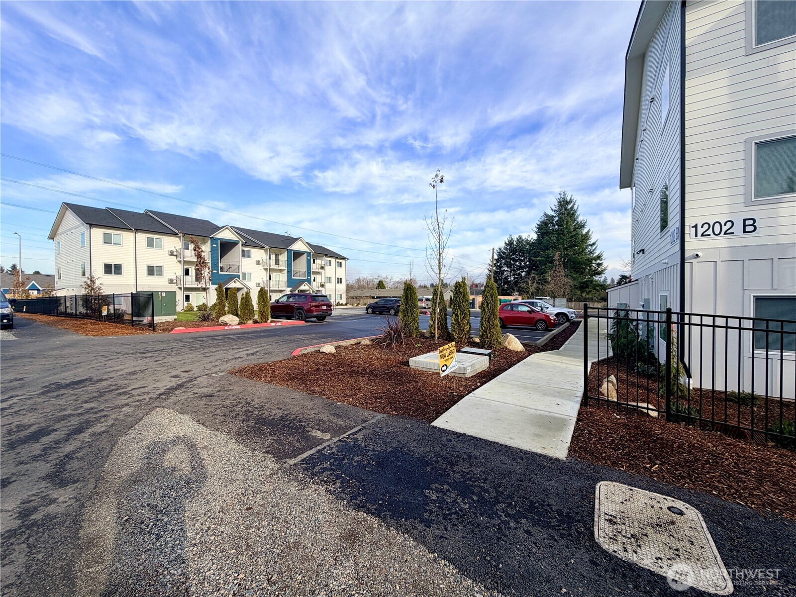 1202 East 72nd Street Tacoma, WA 98404 - Photo 7 of 25 a view of street with parked cars