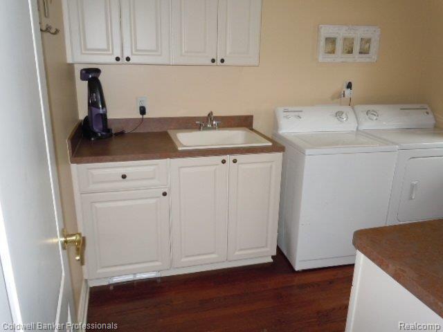 692 Springview Drive Rochester, MI 48307 - Photo 14 of 24 Laundry Room with Hardwood Floor