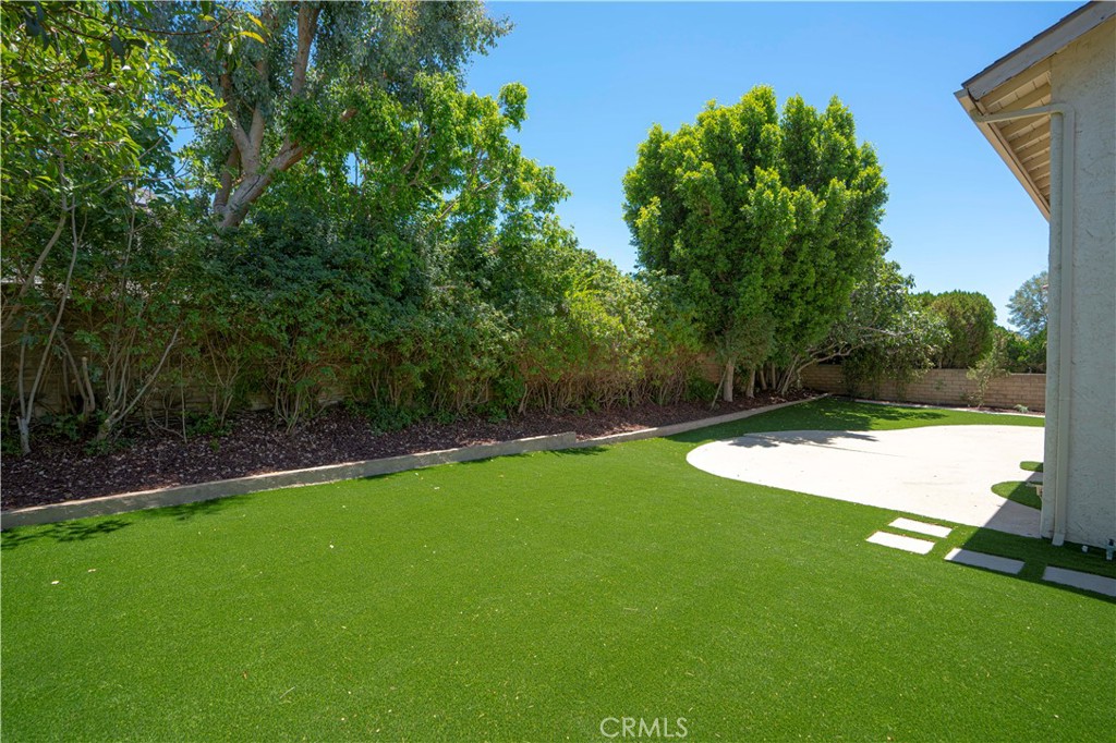 12230 Stewarton Drive Porter Ranch, CA 91326 - Photo 32 of 37 a view of a backyard with a small cabin