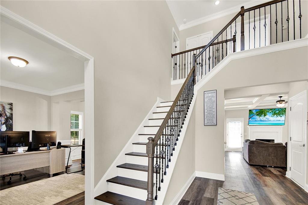 407 Corinth Church Road Winder, GA 30680 - Photo 10 of 66 a view of entryway and hall with wooden floor